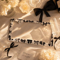 Black coquette bow frame photo 1